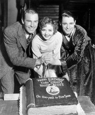 Randolph Scott, Nancy Carroll, and Cary Grant with Birthday Cake 1933 Photo