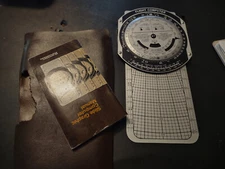 VINTAGE JEPPESEN SANDERSON METAL FLIGHT COMPUTER WITH ALL PAPER WORK/POUCH