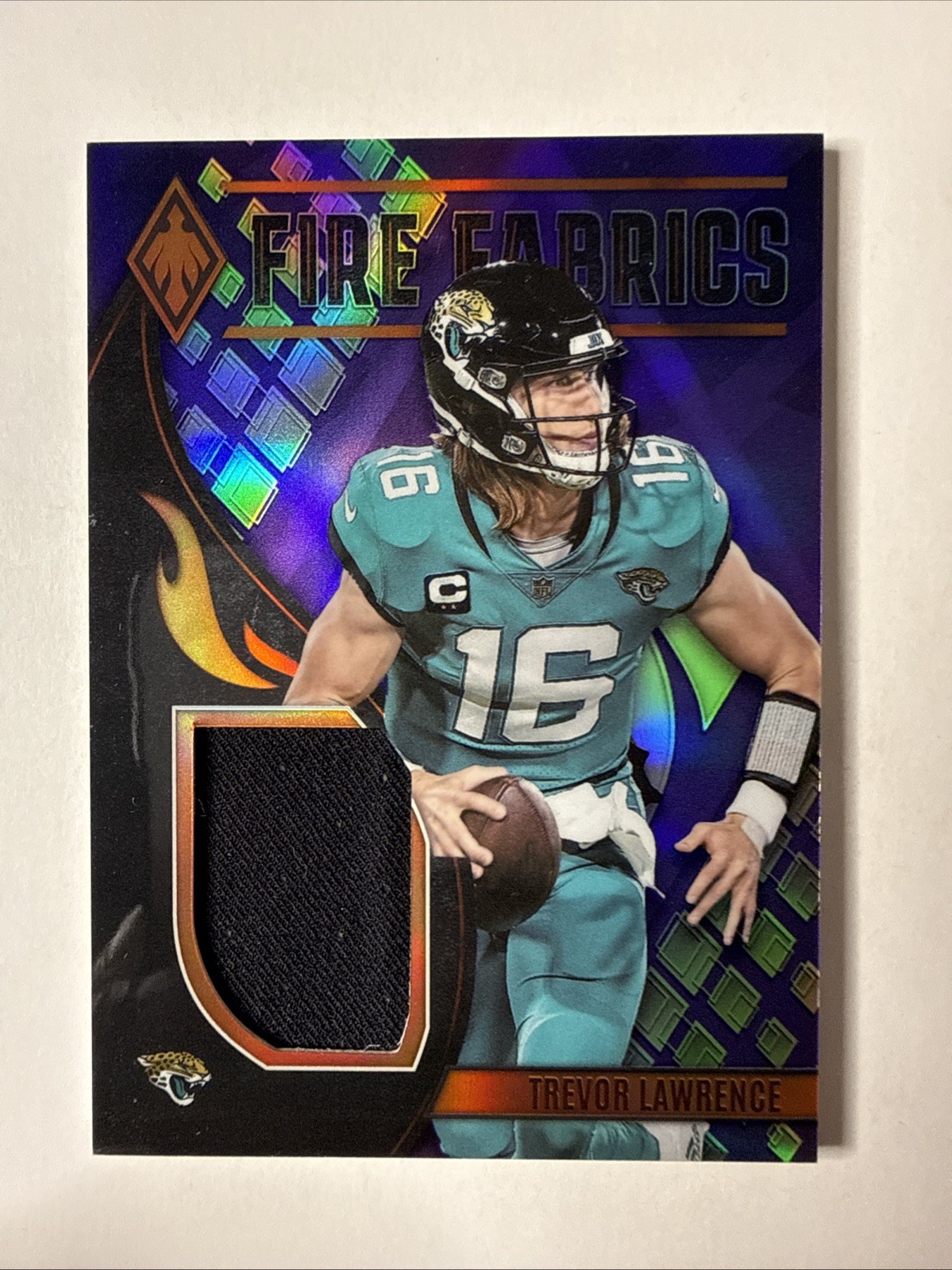 2023 Panini Phoenix Fire Fabrics #FIRE-5 Purple Prime Trevor Lawrence /50 SSP