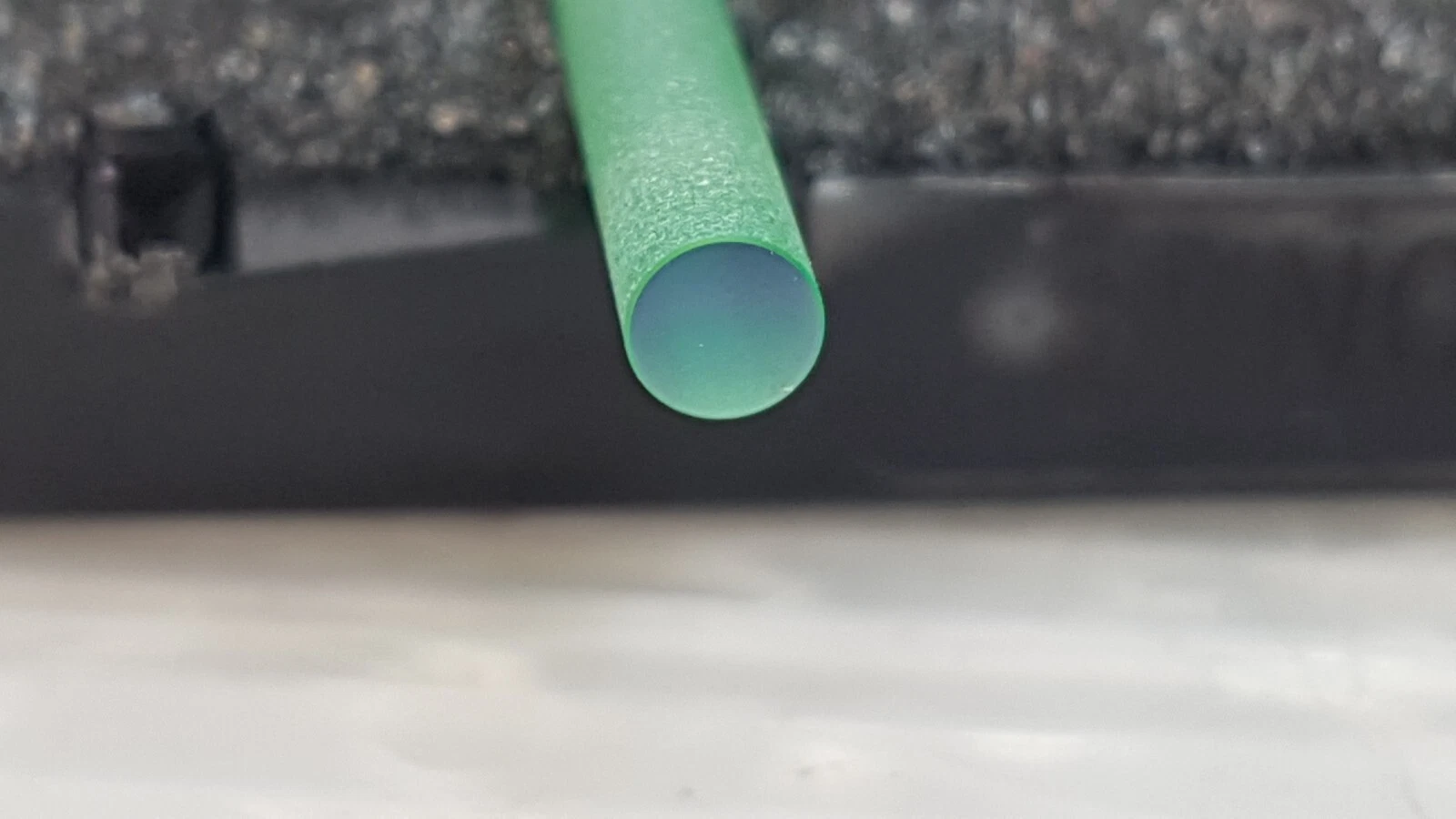 End of the H0236E laser rod resting on dark foam