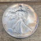 BEAUTIFULLY RIM TONED 1986 .999 Fine Silver American Eagle Coin - 1 oz / ozt