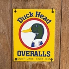 VINTAGE Duck Head OVERALLS UNION MADE SERVICE PUMP STATION PORCELAIN GAS SIGN