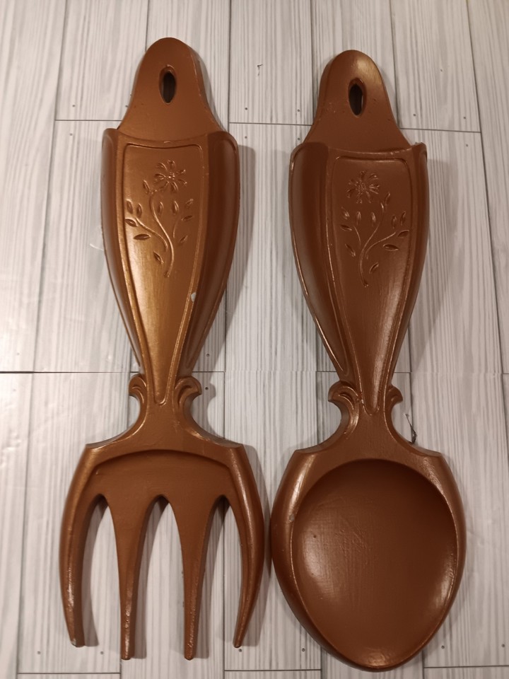 Authentic 1969 Sexton USA deep-gold aluminum spoon & fork wall art — a true MCM kitchen icon that's instantly recognizable and wildly nostalgic.