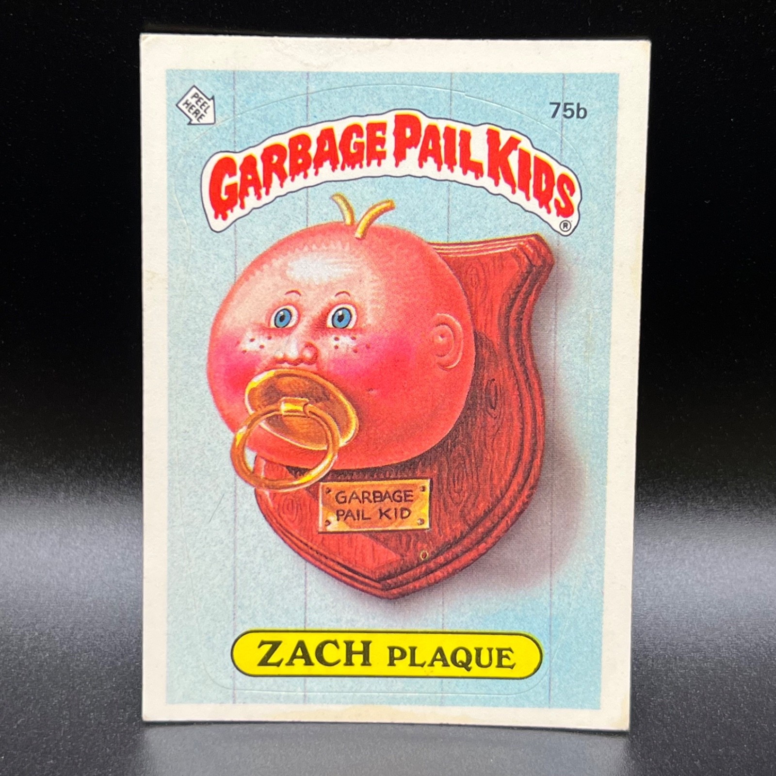 ZACH Plaque #75b 1985 Garbage Pail Kids trading card — raw and PSA graded price guide