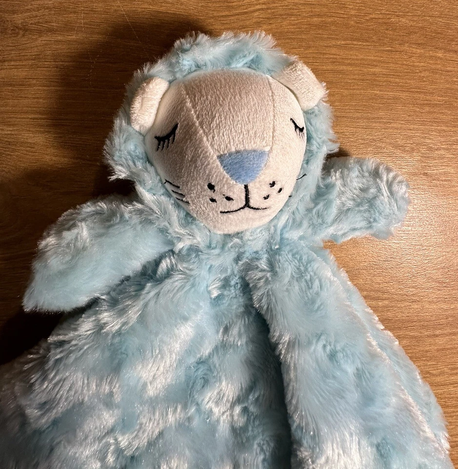 Manta de seguridad Manhattan Kids azul aguamarina Lovey león ojos dormidos Rosetta remolino Foto 3 de 4