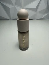 Positive Light Liquid Luminizer Enlighten by Rare Beauty 0.5 Fl Oz Highlighter