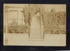 C3955 UK Front Gate and House covered with vine RPPC vintage postcard