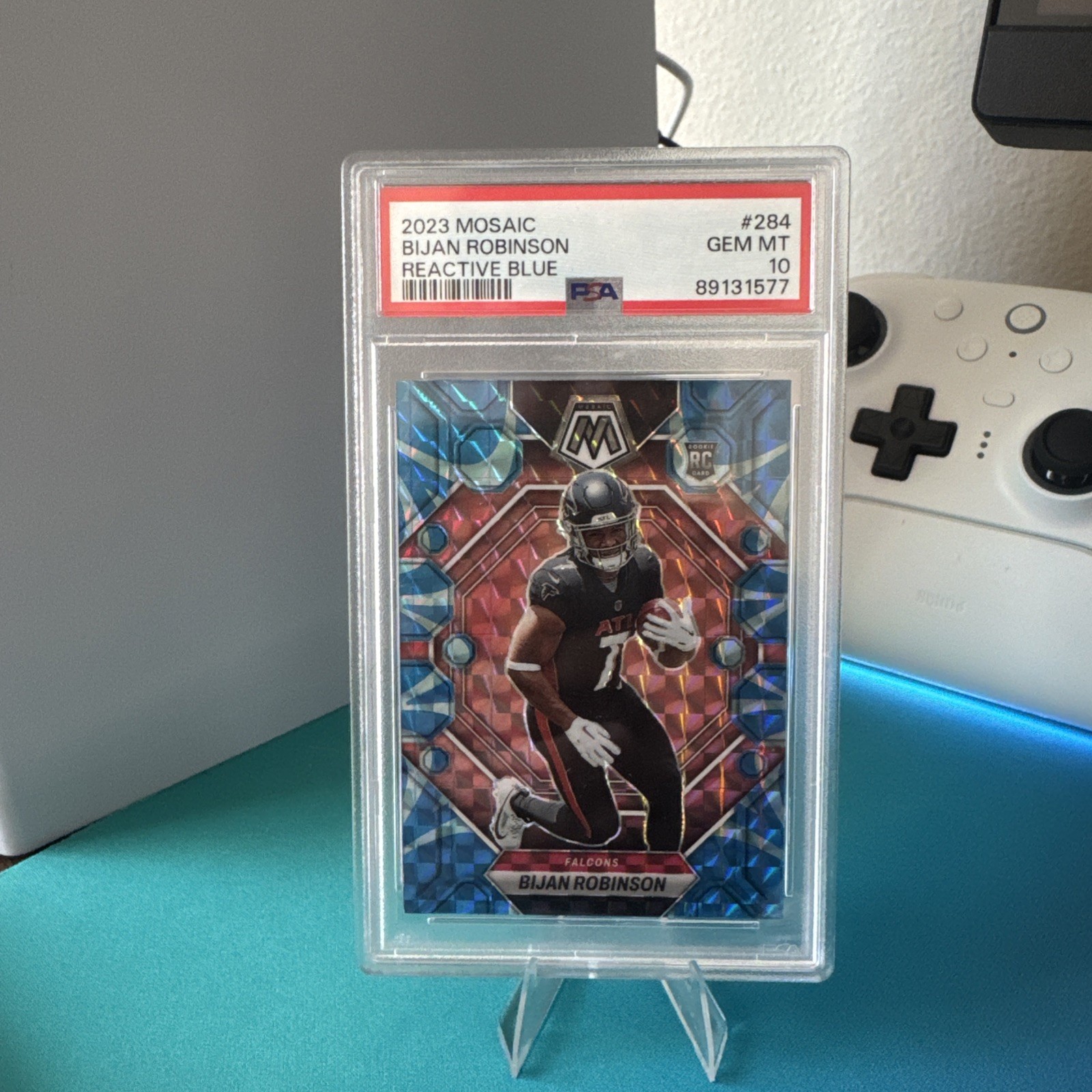 2023 Panini Mosaic PSA 10 Bijan Robinson Reactive Blue Prizm Falcons RC #284