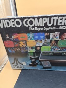 atari 2600 in original box With 29 Games In Box Read DESCRIPTION