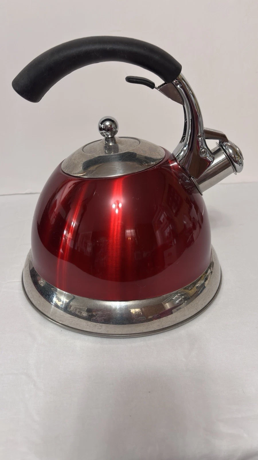 Red whistling tea kettle preowned IL Mulino New York.