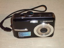Samsung S860 digital camera. Powers on, zooms, focus,  shutters. No Flash