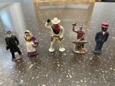 Vintage Collection of Cast Iron Figurines Cowboy Minister Coachman Maiden etc