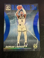2023-24 Panini Donruss Optic - Raining 3s Damian Lillard #2 Blue Prizm /49