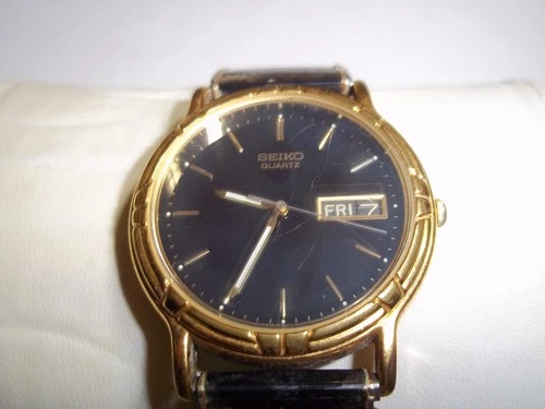 Men's Seiko Day Date 7N43-8138 Japan Quartz Watch Black Gold