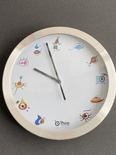 Wanduhr - Metall - Zifferblatt Symbole mit Auge -Logo - NEU
