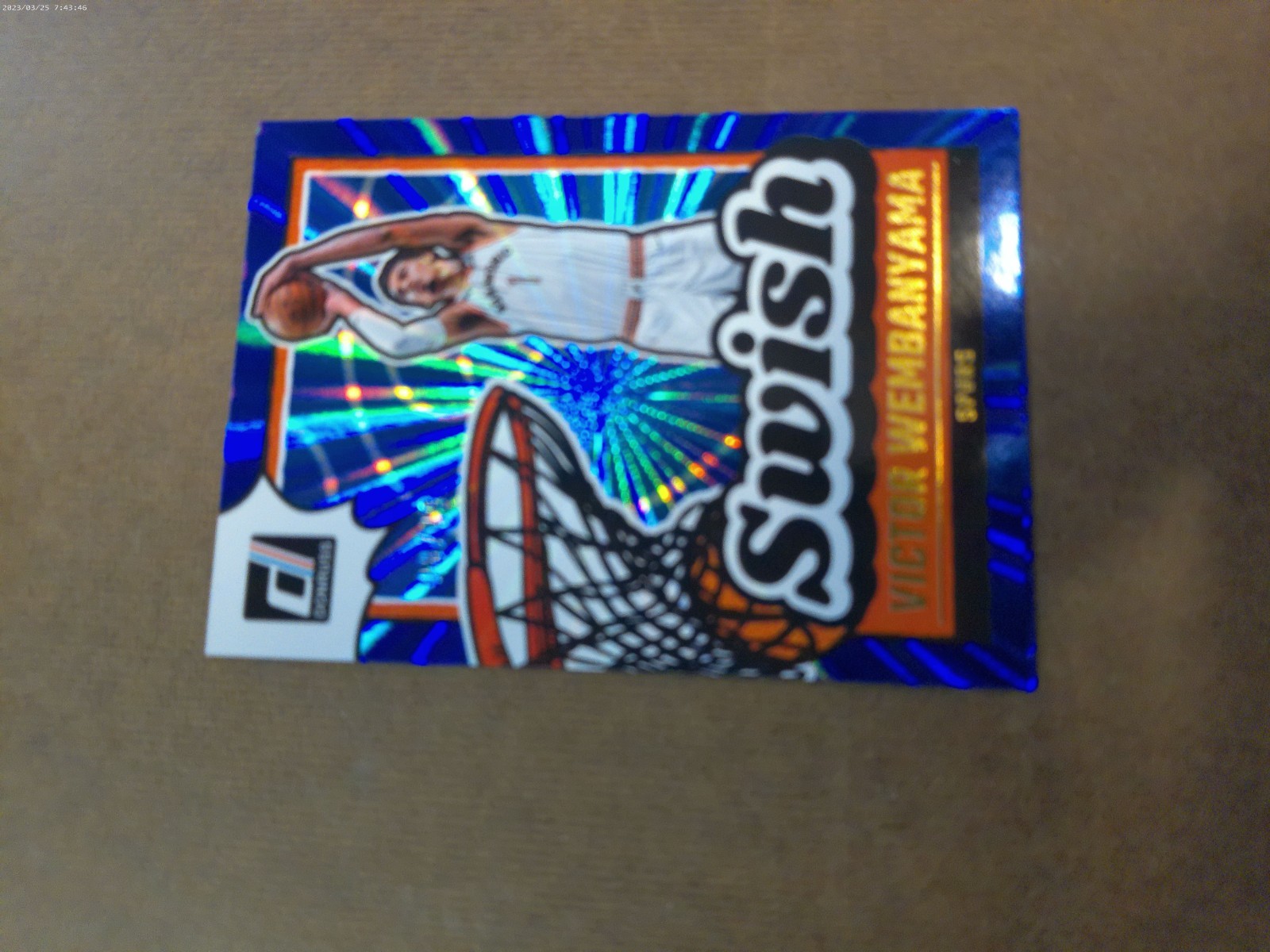 2024-25 Panini Donruss Swish Holo Blue Laser Victor Wembanyama /49 #15 - Spurs