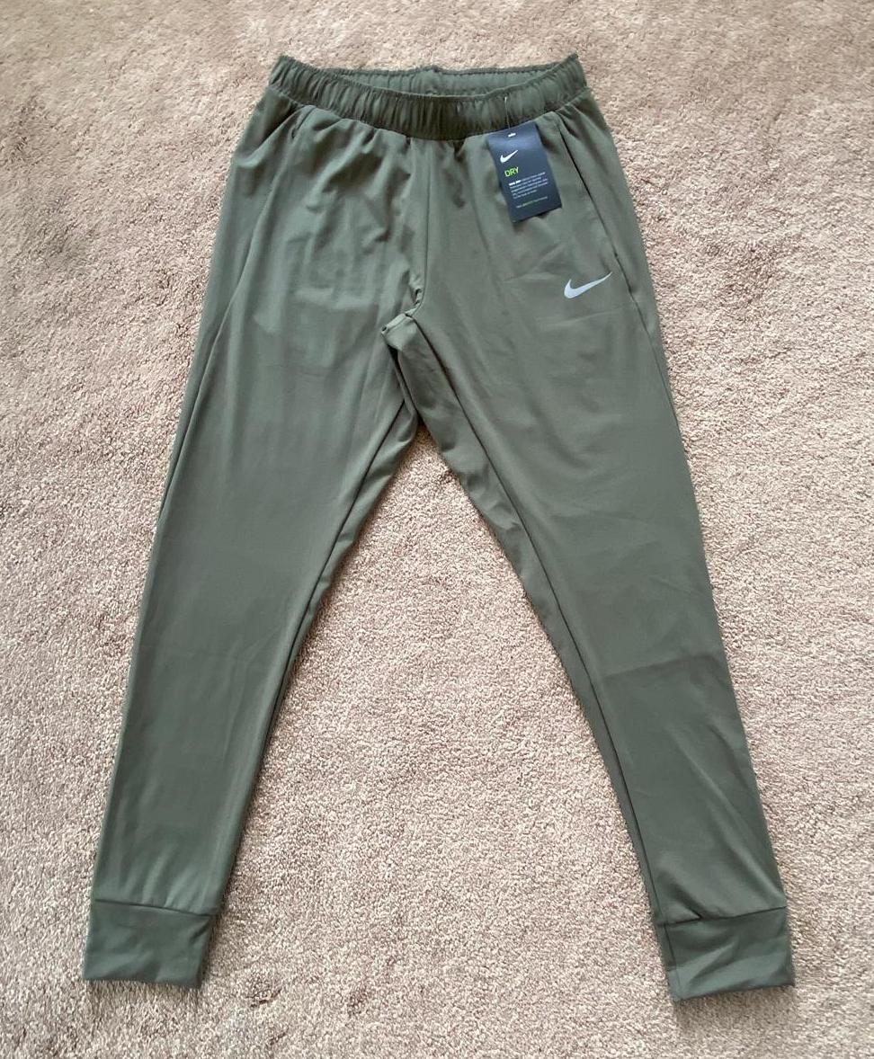 NWT Nike Dri-FIT Men's Tight Fit Jogger Bottoms Pants Olive NWT Nike Dri-FIT Men's Tight Fit Jogger Bottoms Pants Olive