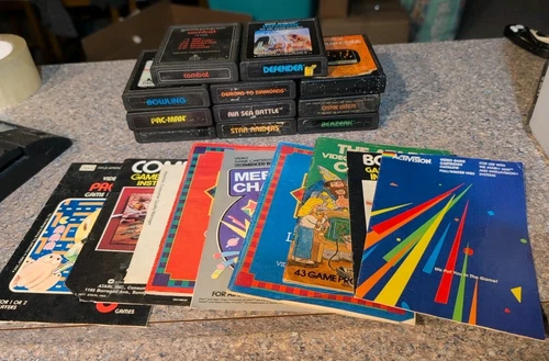 Atari 2600 7800+ Lot Of 11 Games Some Manuals Pacman Berzerk Megamania Pong