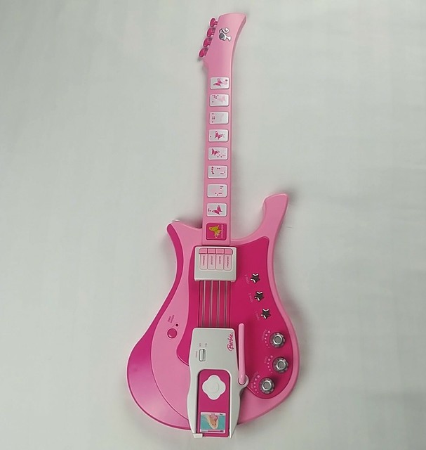 barbie playing guitar