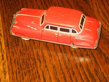 Vintage Red Tin 4 Door Car Toy Lithograph Vehicle 3 1/2" L