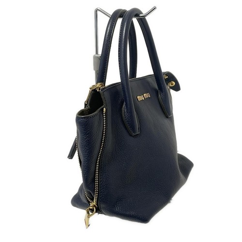 Auténtico bolso de mano de cuero azul marino Miumiu Madras 5BA003 - Imagen 2 de 9