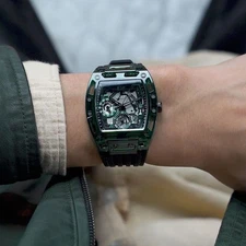 1.Guess Phoenix  Men's Watch | Green Tonneau Skeleton Dial Silicone Strap 