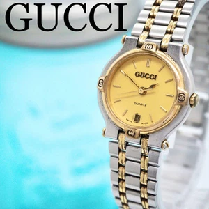 Montre GUCCI 9000L Combi Femme Date Or