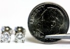 GIA certified 10k white gold .62ct I1 H-I round diamond 4 prong stud earrings — photo 4