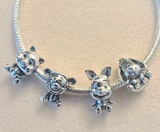 Set Of Four Winnie-the-Pooh Sterling Silver Charms For Charm Bracelets
