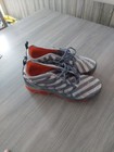 These are Nike Air VaporMax Plus Wolf Grey Stripe shoes — photo 4