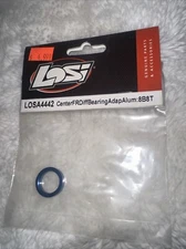 LOSA4442	Losi 8B/T Center Front Diff Bearing Adapter - Blu Aluminum  A-4442