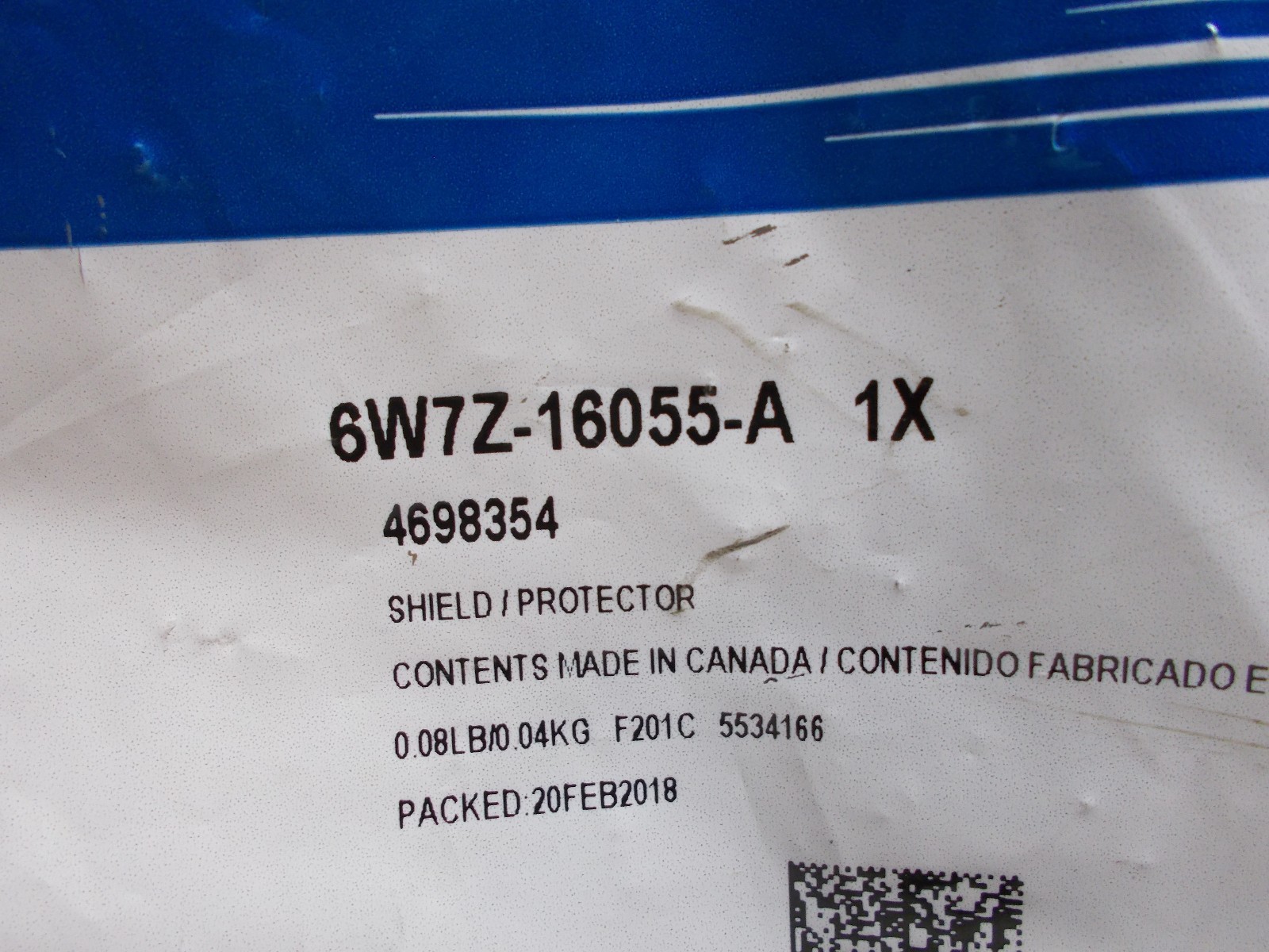New Ford OEM Splash Guard 6W7Z16055A.