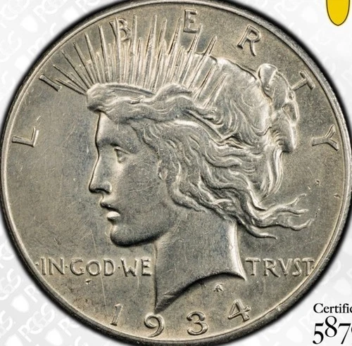 1934-s  Peace Silver Dollar.  PCGS Genuine - AU Detail - Choice Eye Appeal