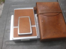 polaroid camera sx70/chrome body/leather skins/lens 116mm/F/8 optics good.