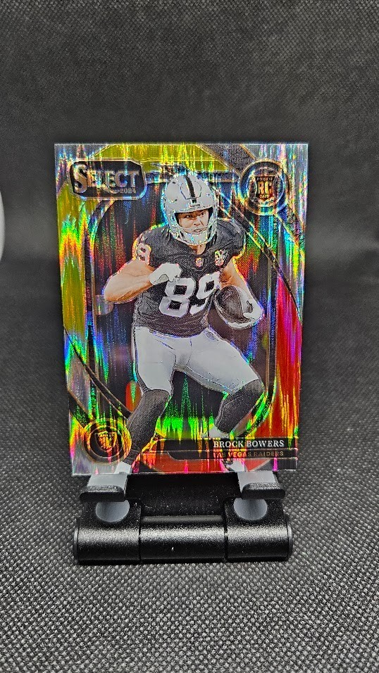 2024 Panini Select - Club Level Brock Bowers #222 Red & Yellow Shock Prizm (RC)