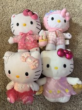 4 Hello Kitty Plushies