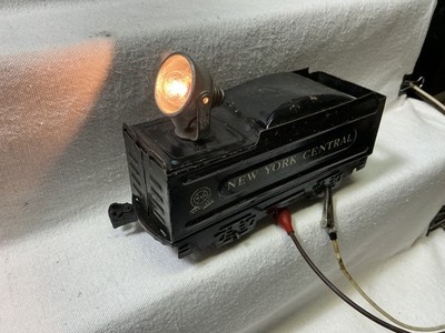 Marx NYC wedge lighted tender, 4-wheel. The center rail pick-up is original.