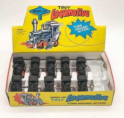 Vintage 70er Jahre Display mit 10 Stck. ,,TINY Mini-Lokomotive,, unbespielt OVP