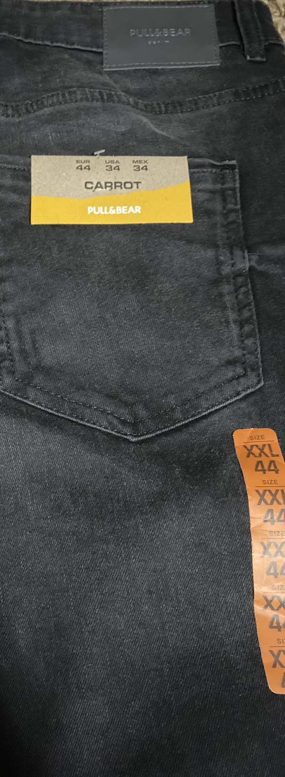 pull and bear carrot fit black jeans US 