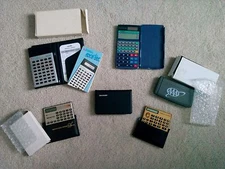 Lot of 6 Collectible/Usable Calculators avstar, Casio, AAA, Sharp, AMEX, McAuto