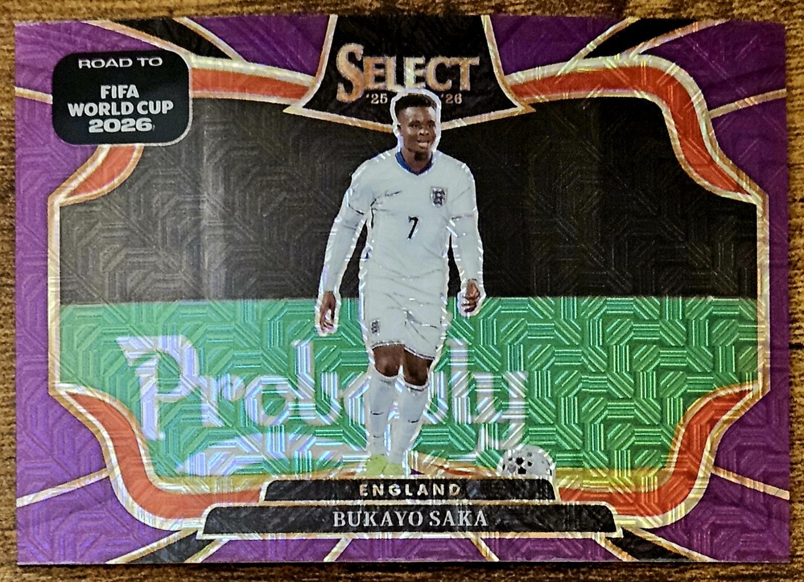 2025-26 Panini Select WC 245 Bukayo Saka Purple Mojo Prizm SP England Arsenal view 1