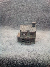 Antique Cast Iron Colonial Still Coin Bank