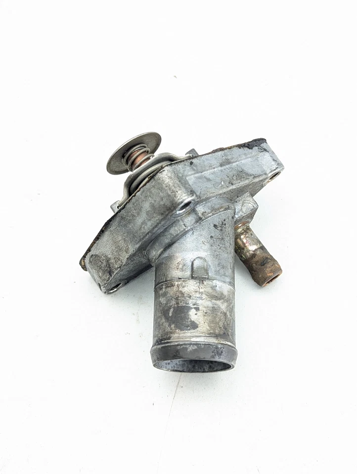 Infiniti G35 2003-2006 cupé VQ35DE carcasa termostato Foto 2 de 4