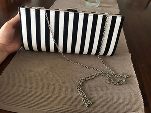 black and white striped clutch bag