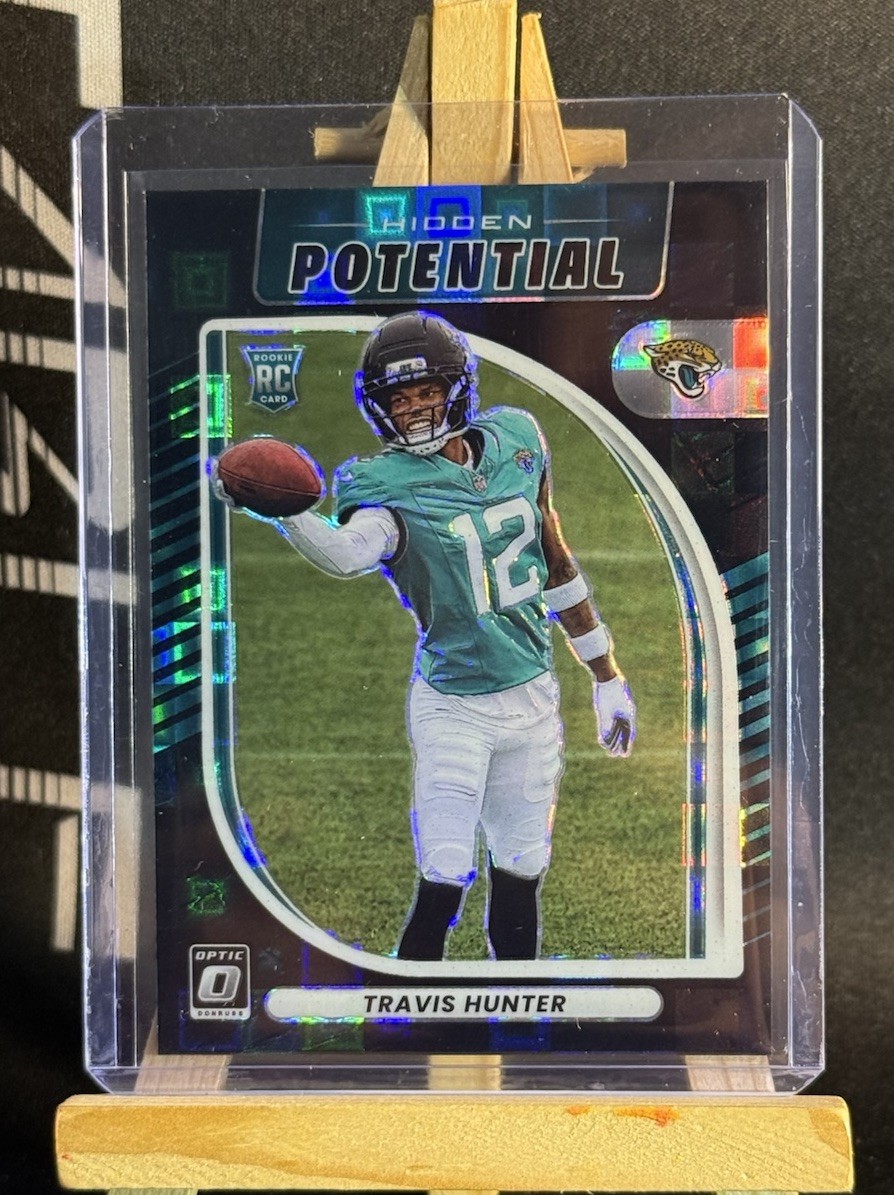 2025 Panini Donruss Optic - Hidden Potential Travis Hunter Black Pandora /149 RC