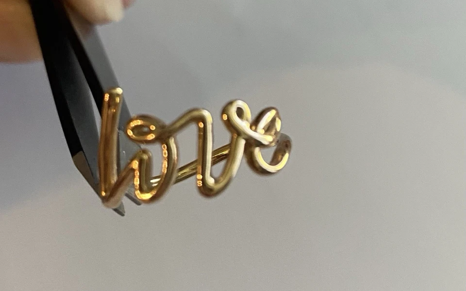 Anillo de amor Tiffany & Co. Paloma Picasso de oro amarillo de 18 quilates con graffiti (20238-NXXH) Foto 2 de 4