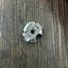 Sewing Machine Bobbin Case with Shrapnel Computer Flat Car Accessories