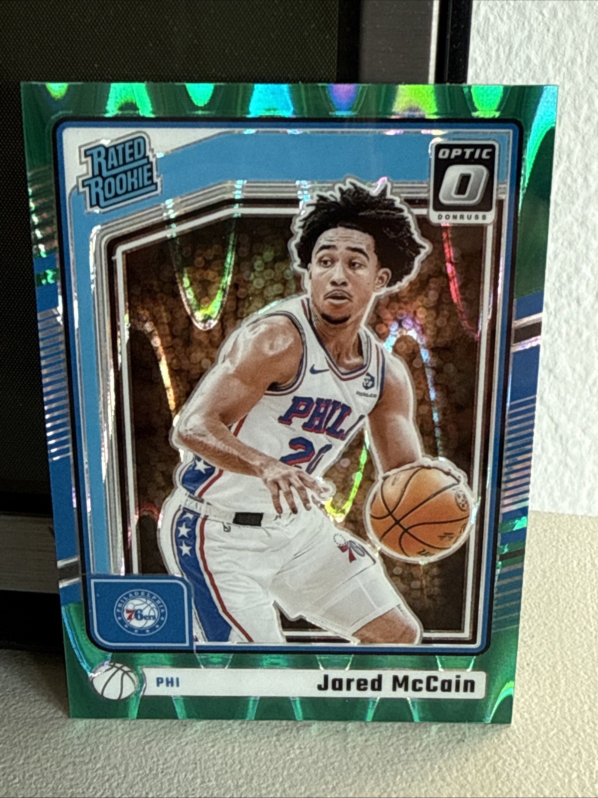 2024-25 Panini Donruss - Rated Rookie Jared McCain #228 Holo Green Laser (RC)