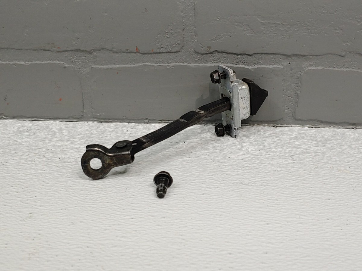 2008-2012 Mazda Cx-7 Rear check stop for door OEM passenger or