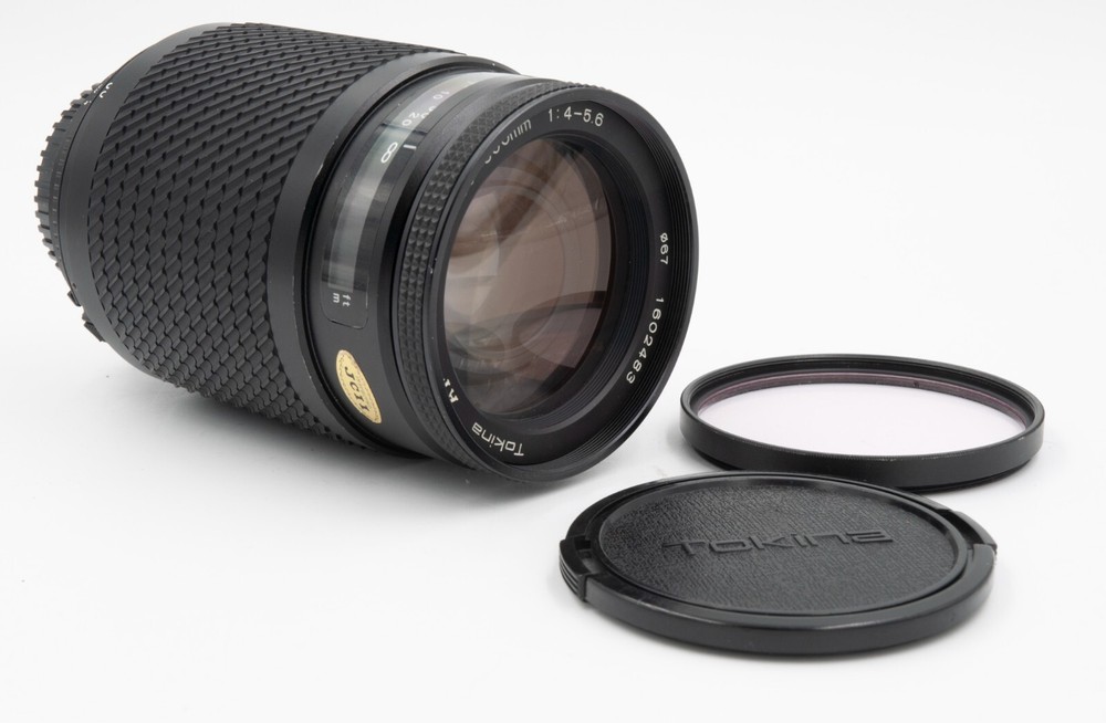 Tokina AF 60-300 f4-5.6 for Nikon AF Mount w/AF Motor In Camera Only In VG Cond.